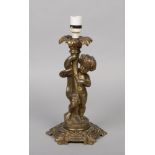 An early 20th century French gilt bronze tablelamp base. Formed as a putti holding a cornucopia