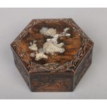 A Japanese haxagonal carved wooden box and cover. With Shibayama decoration depicting a cockerel and