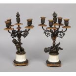 A pair of 19th century French bronze and alabaster figural five branch candelabra. With gilt