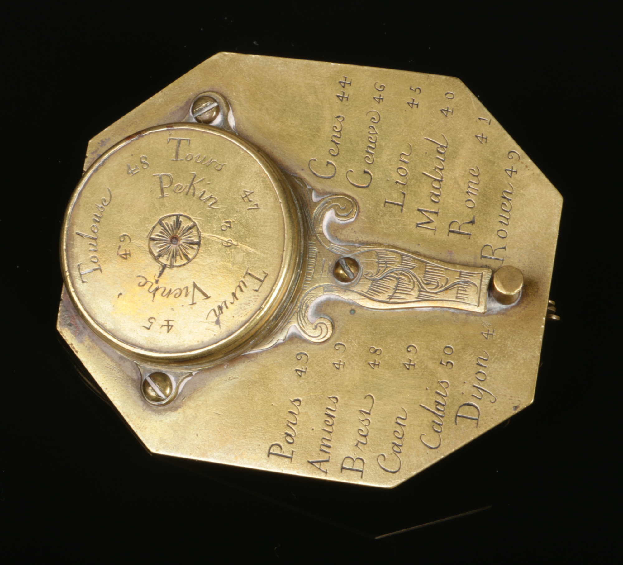 An 18th century brass Butterfield pocket sundial compass. With folding gnomon ornamented with a pair - Image 4 of 4