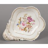 A Rockingham dessert dish with anthemion and gadroon moulding. With gilt borders and delicately