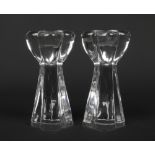 A pair of Baccarat crystal quatrefoil shaped candlesticks. Acid etched marks, 17.5cm.Condition