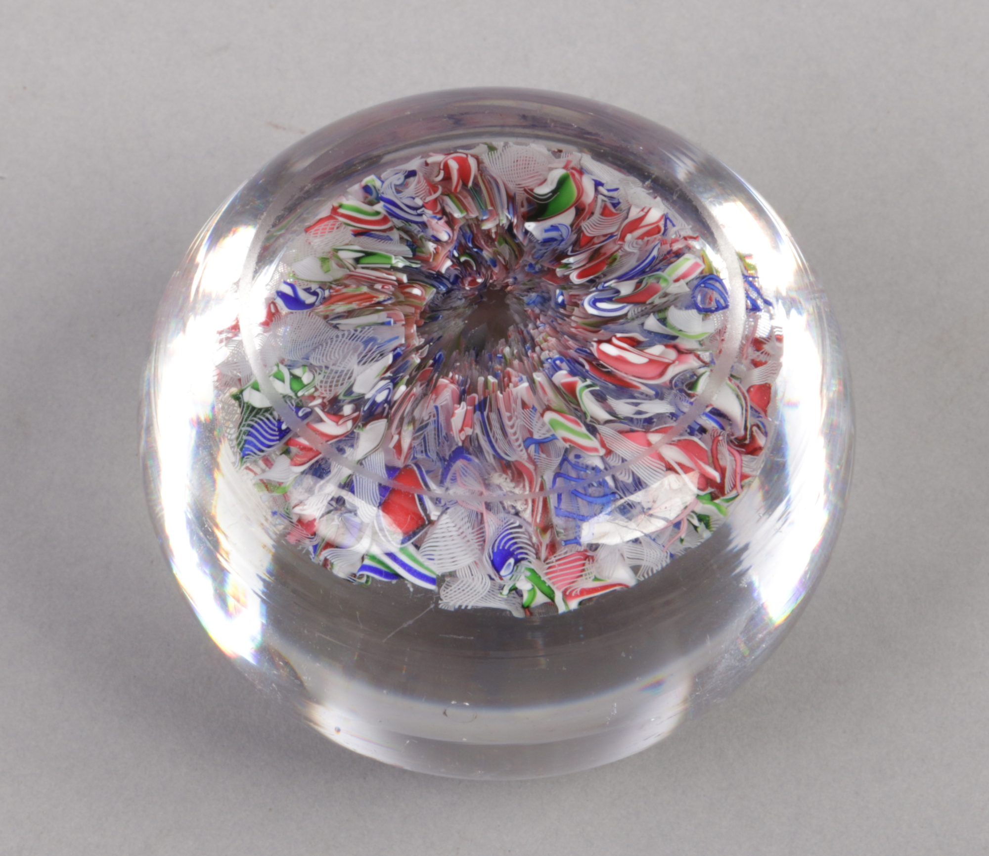 A Baccarat style scrambled glass paperweight, 7.75cm diameter.Condition report intended as a guide - Image 2 of 2