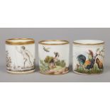 A 19th century Vienna coffee can painted with a cockerel and a hen in a landscape with elaborate