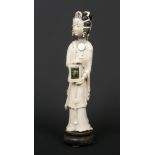 A 19th century Chinese carved ivory figure of a maiden wearing long flowing robes. With stained