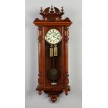 A 19th century Gustav Becker twin weight Vienna wall clock. With enamel dial incorporating