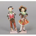A pair of Royal Doulton figures, Pearly Boy and Girl. HN1482 and 3. 13.5cm.Condition report intended