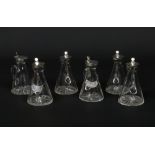 A set of six George V silver topped glass whisky noggins by Hukin & Heath Ltd. Two with collar