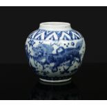A Chinese Wanli (1573-1620) small blue and white jar. Painted in underglaze blue with lion dogs
