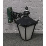 An outside coach style wall lantern on bracelet.