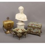 A classical style pottery bust of a semi clad female on separate plinth, along with two Art