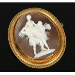 A Victorian Pinchbeck shell cameo brooch, depicting The Three Graces.