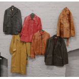 Six leather coats tan, brown and cherry and including full length.