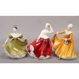Three Royal Doulton porcelain figurines Gail HN2937, Lynne HN2329 and Kirsty HN2381.