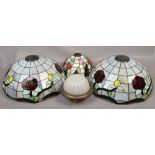 A pair of large Tiffany style lamp shades, smaller example and a brass and frosted glass ceiling