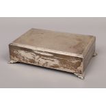 A silver jewellery box with floral decoration to the rim, assayed Birmingham 1964 by J.B.