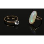 A ladies 9ct gold cubic ziconia solitaire ring size P 2.61 grams, along with a yellow metal opal