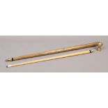 A wood and brass walking cane with concealed section to convert to a snooker cue.