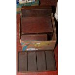 A collection of wooden cutlery boxes and trays.