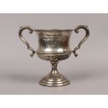 A silver twin handled presentation trophy for annual competition swimming, The Kelly Cup, assayed