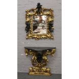 A Rococo style gilt plaster work marble top console table and pier mirro adorned with ebonised