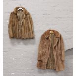 Two ladies fur coats.