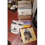 A box of mainly pop and rock L.P records to include Rod Stewart, Status Quo, Shadows etc.