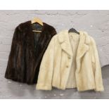 Two ladies fur coats.