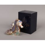 A Royal Crown Derby exclusive commission Coral Seahorse paperweight with gold stopper.