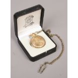 A masonic yellow metal keystone full hunter pocket watch on chain, boxed.