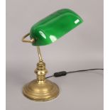 A modern brass effect bankers lamp.