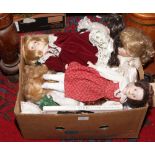 A box of collectors bisque head dolls, along with The Collectors Book of Dolls, Brenda Gerwat