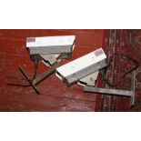 Two bracket mounted Coex CCTV cameras.