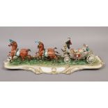A large Capodimonte figure group, courting couple in a horse drawn carriage.Condition report