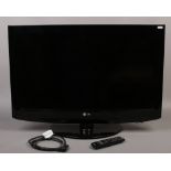 An LG 32inch flatscreen T.V with remote control and power lead, model 32 LH2000.