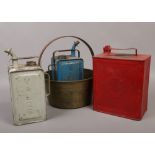 A vintage Shell petrol can, two paraffin cans and a brass jam pan.