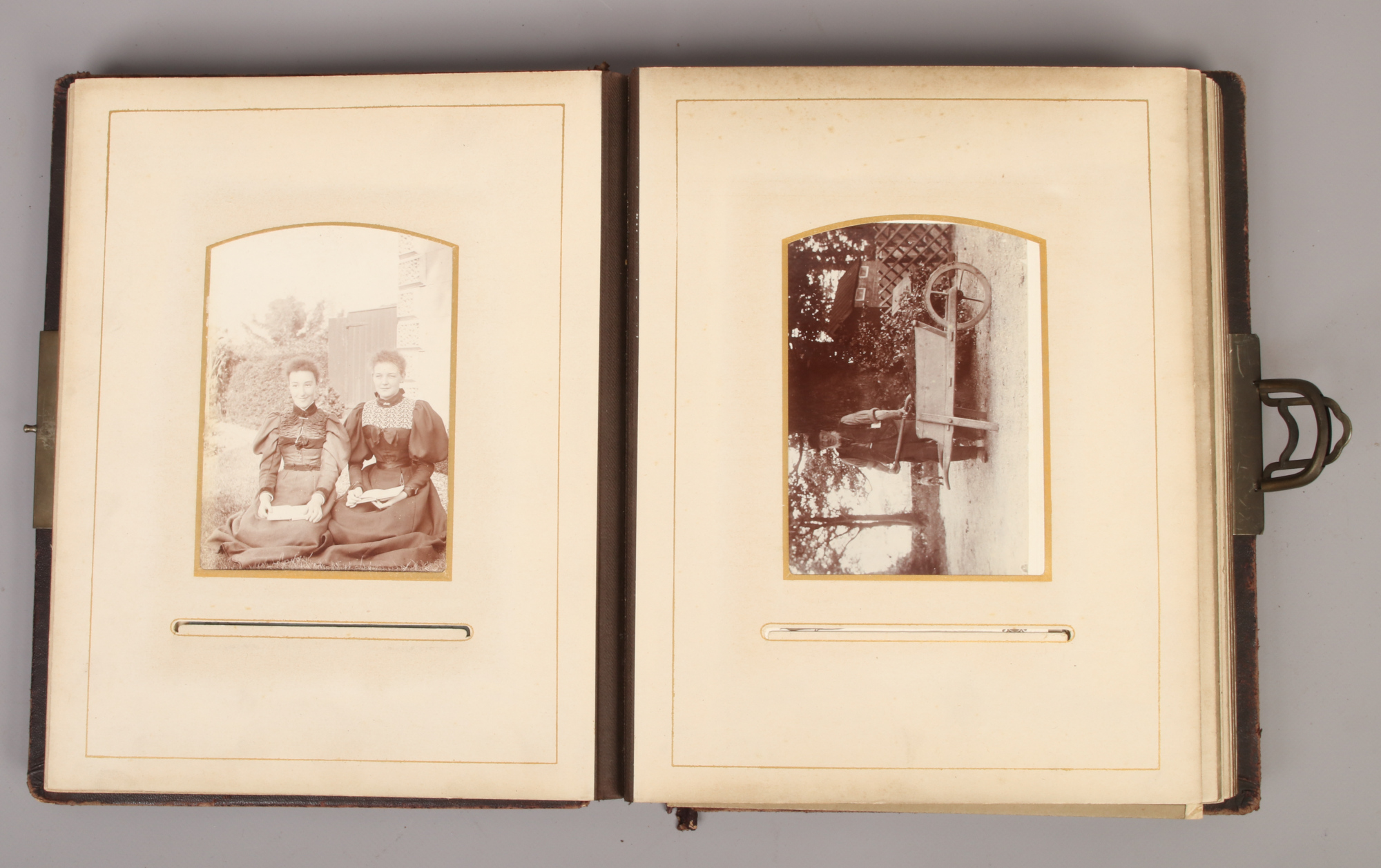 A late 19th / early 20th century photograph album and contents of monochrome portrait photographs. - Image 2 of 2