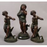 Three composite figures of children to include a pair of figural table lamp bases.