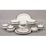 An Edwardian Cauldon pottery dinner service including tureens, plates, sauce boat etc.