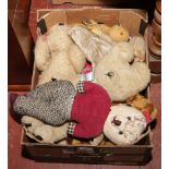 A box of 10 mostly teddy bears to include Sooty glove puppet etc.