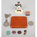 A small group of collectables to include Carltonware Guinness figure, dollar on silver chain,