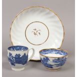 Three pieces of 18th century ceramics to include blue and white sugar bowl and coffee cup etc.