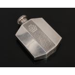 An Art Deco silver plated hip flask by James Dixon & Sons. With engine turned engraving and threaded