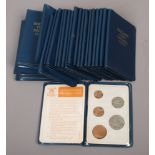 Twenty five Britain's first decimal coins sets.