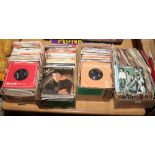 Four boxes of 45rpm single records including T. Rex, Rod Stewart, Cliff Richard, Pet Shop Boys,