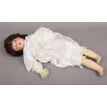 An Armand Marseille 390 German bisque head doll with composite body.