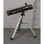 A reflector telescope on tripod stand, Celestron power seeker 76 AZ.