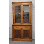 A Victorian mahogany bookcase, over drawer and cupboard base.Condition report intended as a guide