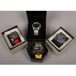 Four boxed gents wristwatches including a G Shock, Henley and Hugo Boss.
