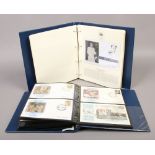 Two folders of first day covers The Queens Golden Jubilee and The Royal Family.